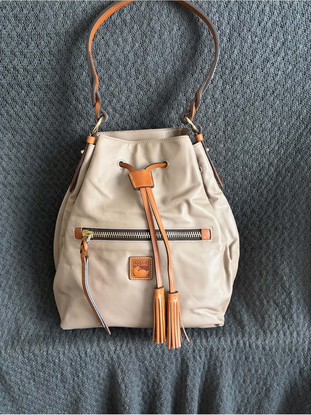 Dooney & Bourke Beige Bucket Hobo with Tan Trim and Tassels